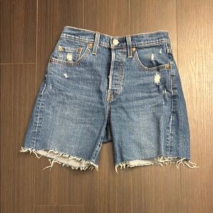 Levi’s 501 midthigh premium medium wash size 25